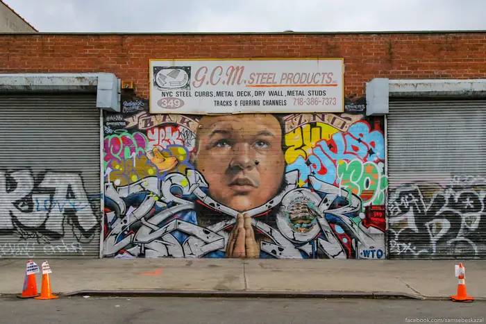 A photo of a graffiti tribute on a garage in Bushwick